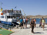 Passengers disembarking from a ferry, Delos, Cyclades Islands.