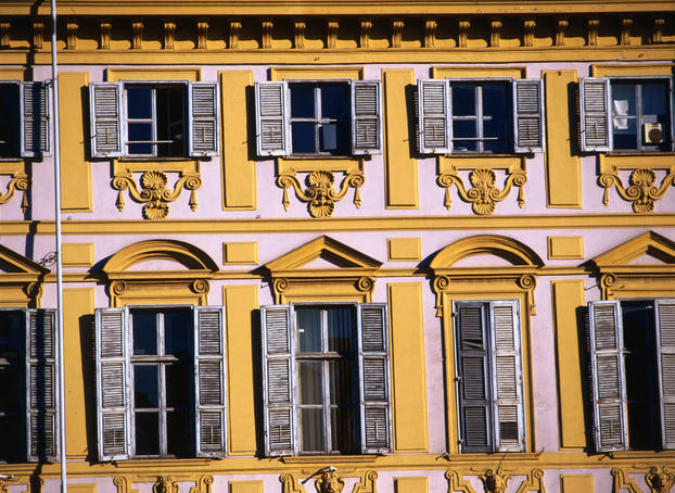 Shuttered windows on the decorative facade of the Piazza San Carlo