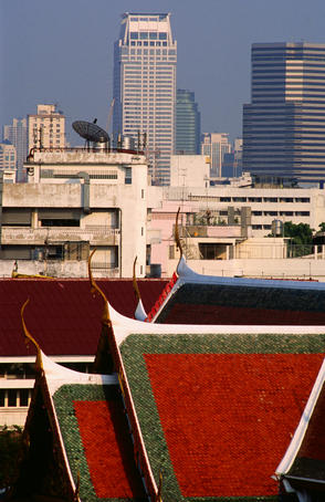 Temple roof and city buildings.