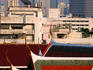 Temple roof and city buildings.