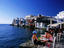 People sitting at waterside bar in Little Venice.