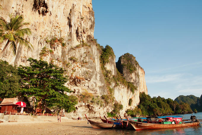 Long-tail boats nosed up to Tonsai beach.