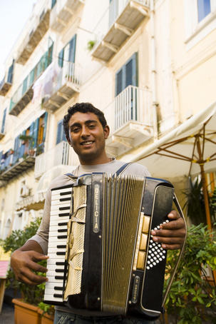 Musician playing accordion in Ischia Ponte.