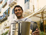 Musician playing accordion in Ischia Ponte.