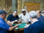 Playing cards at the Dominova Seat.