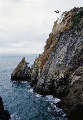 Person cliff diving, Quebrada cliff.