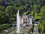 Fountain in full display in front of the Linderhof Palace and gardens.