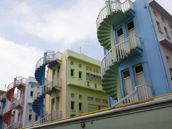 Colourful spiral staircases in a back street.
