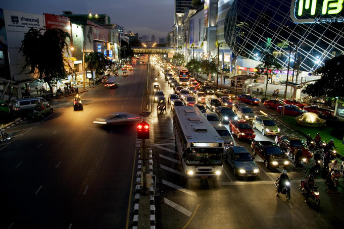 Overhead of city street at night.