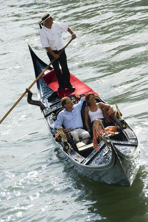 Overhead of tourists in gondola.