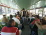Passengers in vaporetto on Grand Canal.