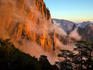 Sunrise and morning fog shrouding cliffs near Bavella.