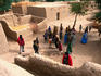 Overhead of tourists in Songhai village.