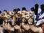Touareg men on camels during festival.