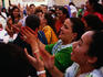 Women celebrating wedding in street.