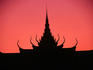 Royal Palace silhouetted at sunset.