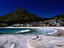 Sunbathers with Clifton Bay in background.