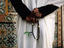 Muslim guard of Gurgi Mosque holding his rosary.