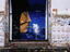 Mural, graffiti & posters on city wall.