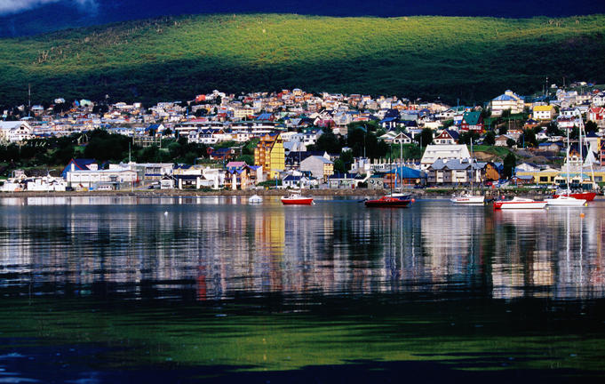 City and yachts moored in harbour.