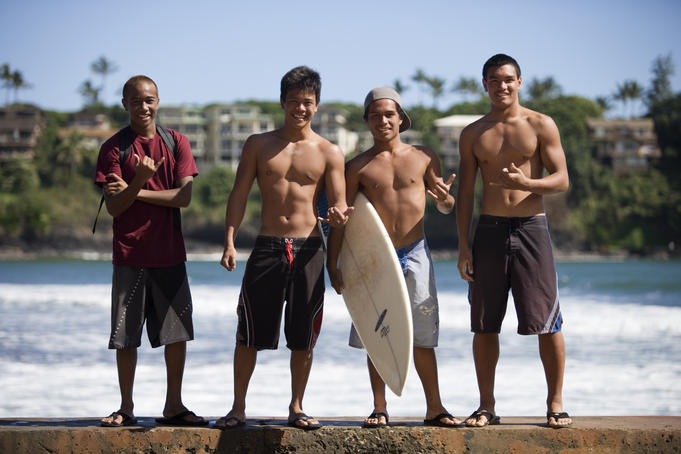 Hawaiian surfer dudes in Nawiliwili Beach Park.