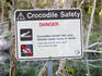 Crocodile warning sign on banks of Barramundi Creek.