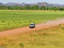 4WD driving along dusty track in Arnhemland.