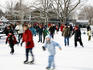People ice-skating on Beaver Lake (Lac aux Castors), Parc du Mont Royal.