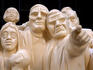 Statue of people by Raymond Mason.
