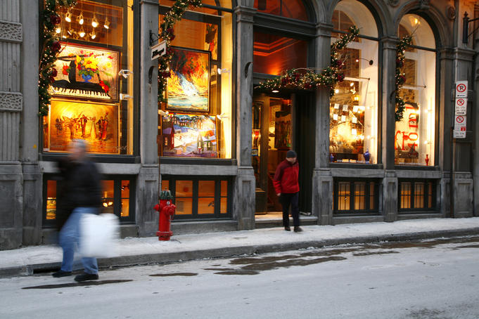 Illuminated art shop window in winter, Rue St. Paul, Old Montreal.