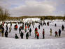 People ice-skating on Beaver Lake (Lac aux Castors), Parc du Mont Royal.
