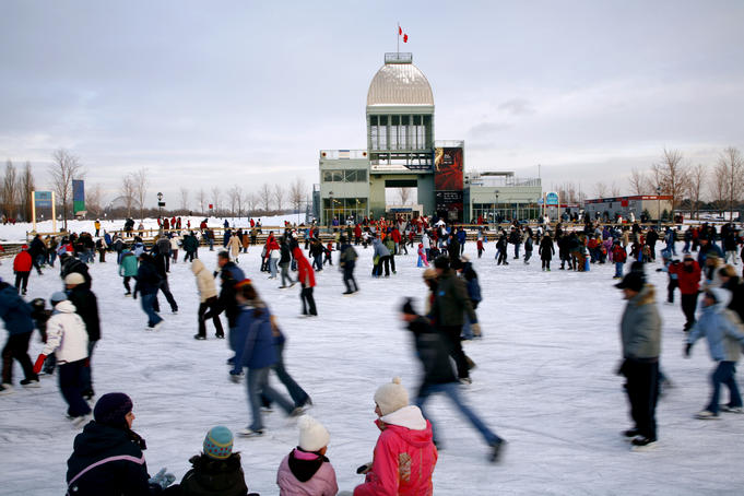 People ice-skating at Parc du Bassin Bonsecours.