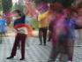 People doing exercises with fans at Temple of Heaven Park.