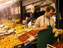 Produce vendor at Naschmarkt.