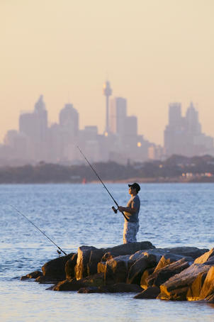 Fishing off rocks at Silver Beach, Botany Bay.
