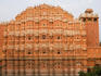 Front facade of pink Hawa Mahal building.
