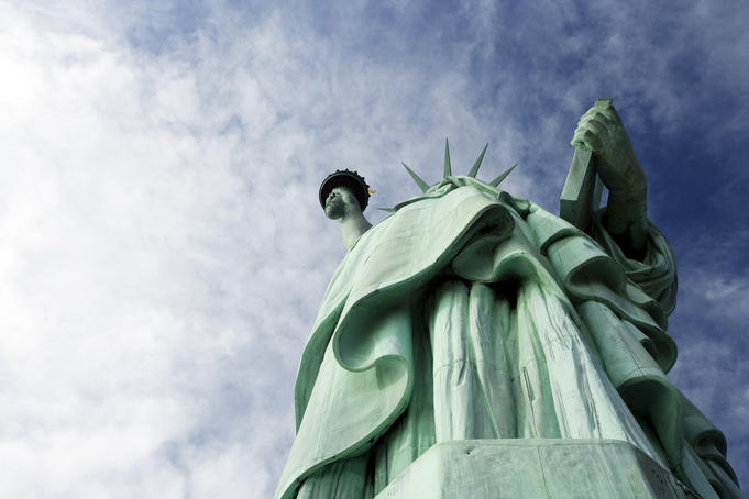 Looking up at Statue of Liberty from below on Liberty Island.