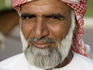 Portrait of Muslim man in dishdash and gutra in Jebel Hafeet Park.