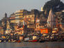 India Varanasi main ghat steps down to river Ganges with iconic pilgrims and bathers at river Ganges Jan 2007