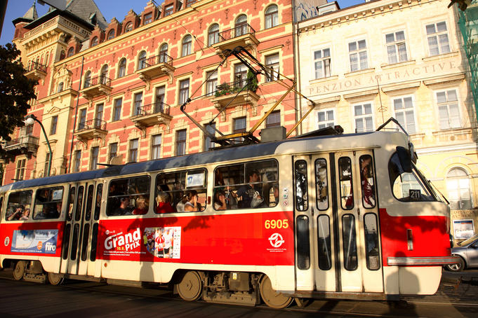 Tram on city street.
