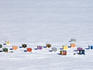 Overhead of ice fishing huts.