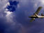 Plane over Maho Beach on approach to Juliana Airport.