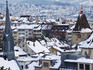 Overhead of snow-covered roofs with the Grimmenturm (medival residential tower), Neumarkt.