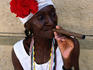 Cuban woman smoking cigar, Plaza de Armas.