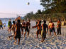 Volleyball game at sunset, White Beach.
