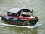 Tourist boat on Singapore River.