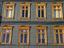 Pressed-tin-and-wood house facade.