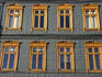 Pressed-tin-and-wood house facade.
