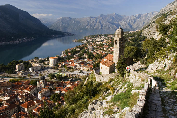 Old church on rocky mountain above town of Kotor.