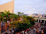 Tourists on Tsim Sha Tsui Promenade near Cultural Centre.